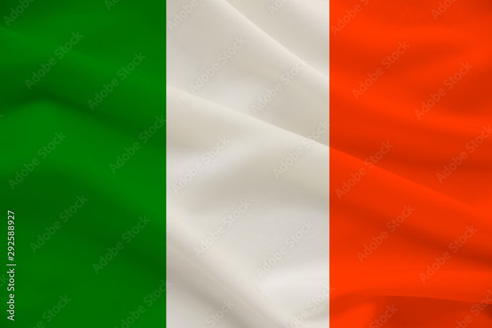 national flag of the country ireland on delicate silk with wind folds, travel concept, immigration, politics, copy space, close-up