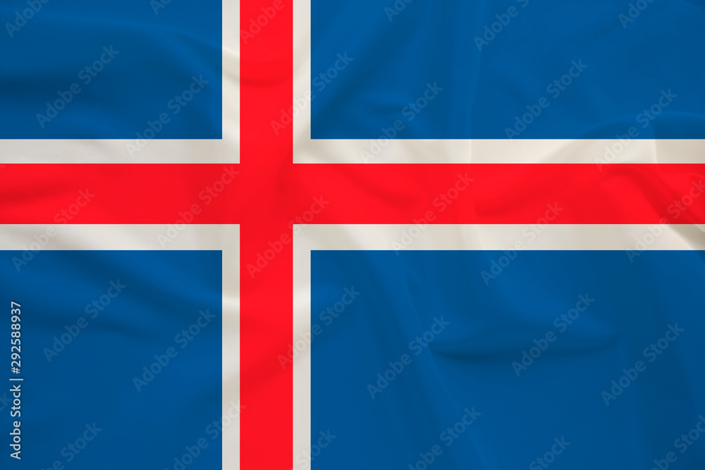 Fototapeta premium national flag of the country iceland on delicate silk with creases from the wind, concept of travel, immigration, politics, copy space, close-up