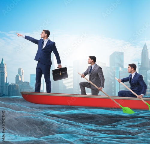 Team of businessmen in teamwork concept with boat © Elnur