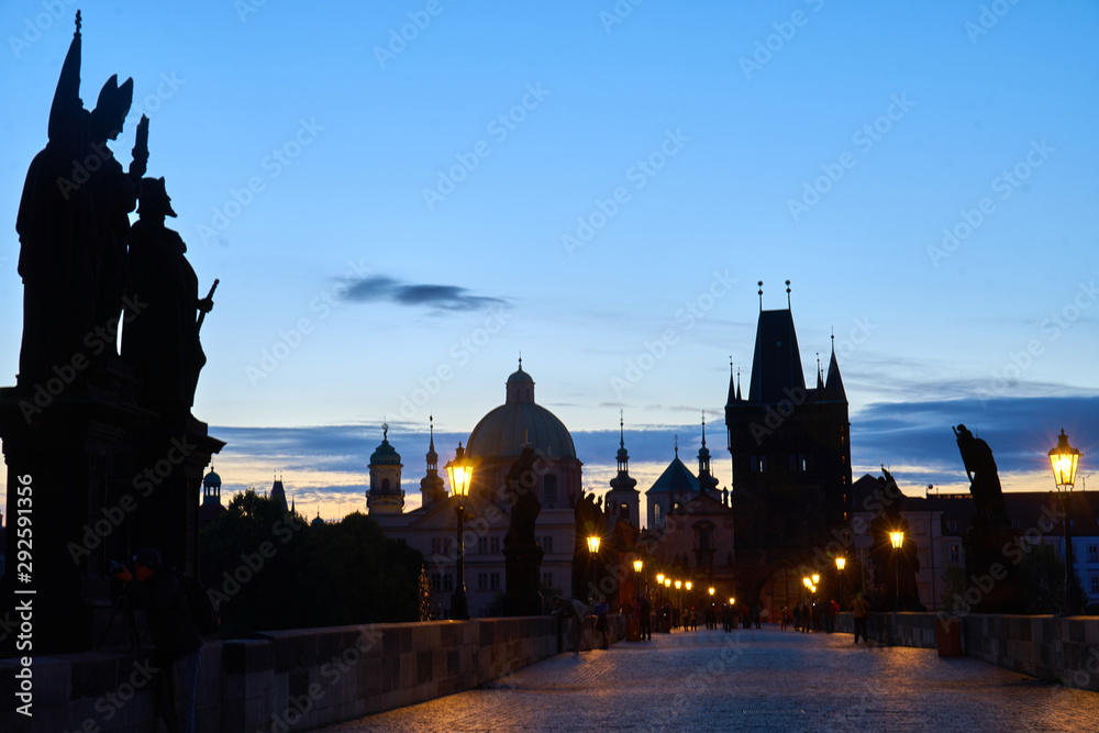 Fototapeta premium Prague - Charles Bridge and Old Town area at sunrise