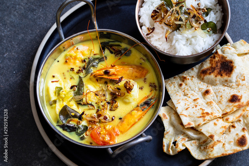 Meen moilee Indian fish curry photo