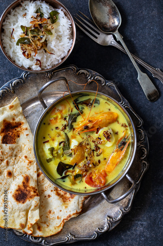 Meen moilee Indian fish curry photo