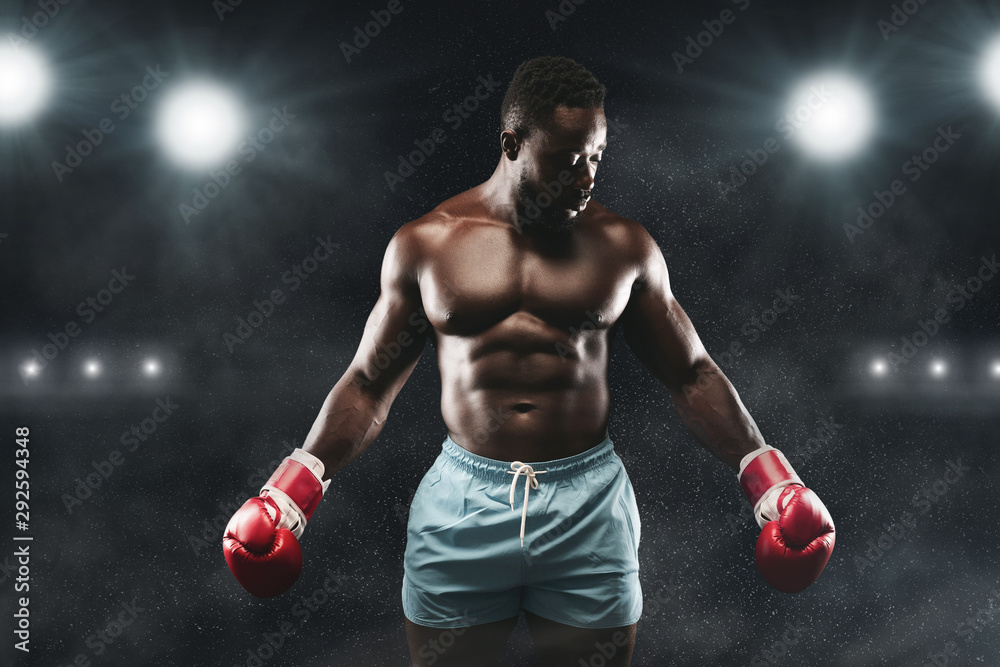Muscular boxer getting ready for final battle
