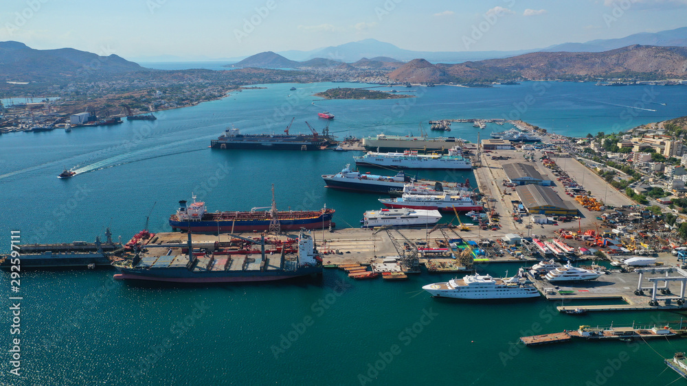 Aerial photo of industrial shipyard of Perama repairing small boats near Salamina island, Attica, Greece