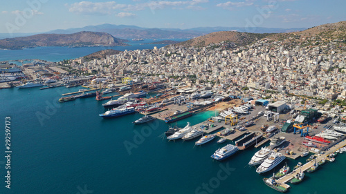 Aerial photo of industrial shipyard of Perama repairing small boats near Salamina island, Attica, Greece © aerial-drone