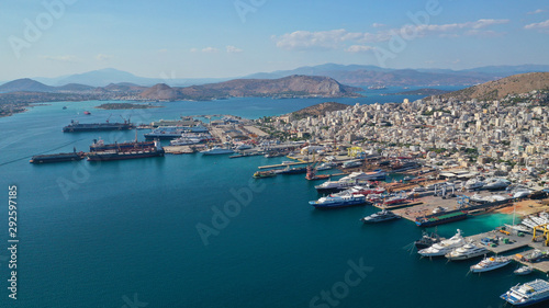 Fototapeta Naklejka Na Ścianę i Meble -  Aerial photo of industrial shipyard of Perama repairing small boats near Salamina island, Attica, Greece