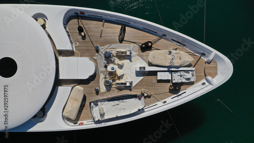 Aerial drone top down photo of yacht nose docked in Mediterranean popular destination port © aerial-drone