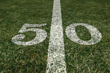 American Football 50 yard line football field and game