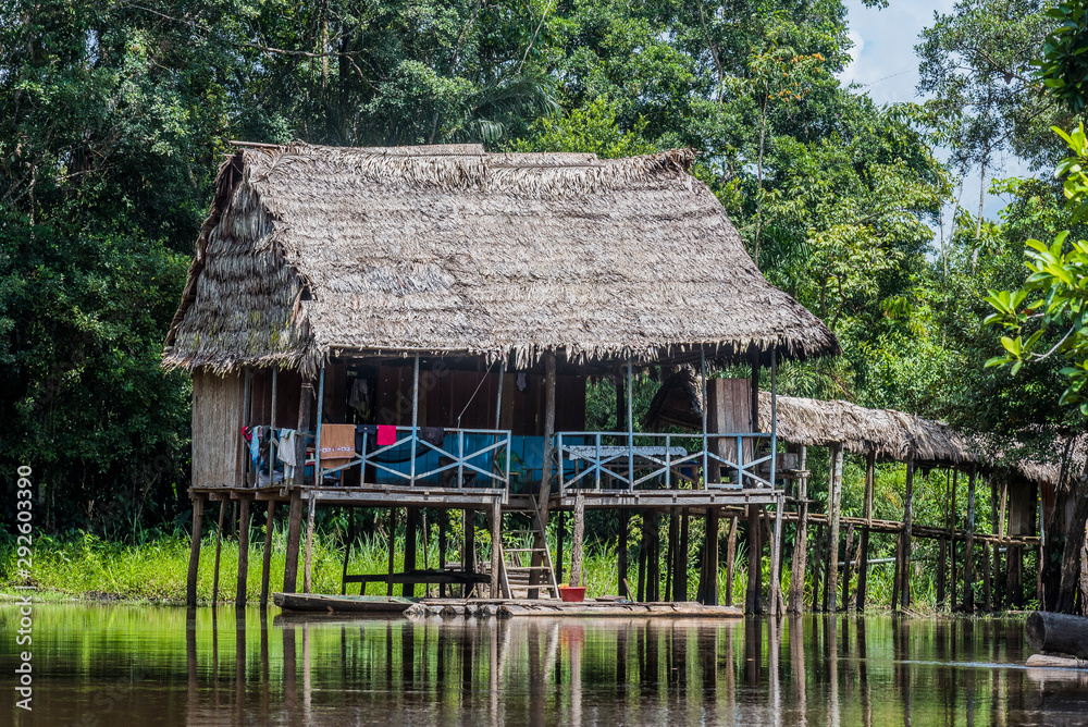 Traditional house in Pacaya Samiria reserve at jungle from Perú. Traditional house in Pacaya Samiria reserve at jungle from Perú.