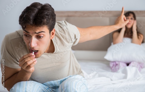 Man suffering from impotency with pill photo