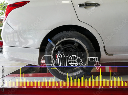 The car checks technology monitor the wheel sensors on for wheels alignment photo