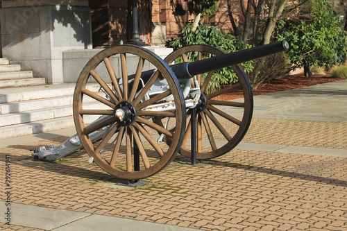 Vintage restored cannon on display in small town square