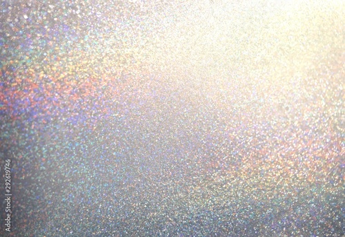 Silver shimmer decorative texture. Brilliant dust abstract background. Bright glitter surface. Winter celebration.