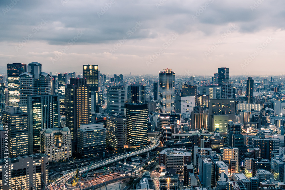 Cityscape of Osaka City in the evening.