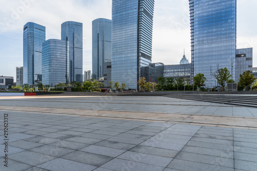 park pedestrian walkway and modern skyscrapers, china.