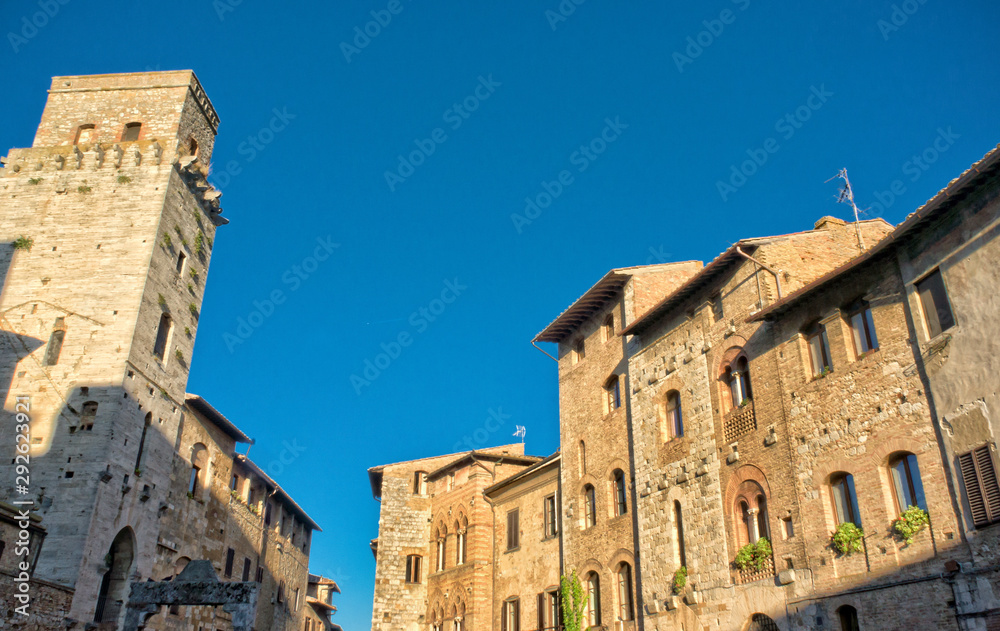 Square in the medieval town of San Gimignano - Tuscany Italy