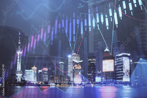 Wallpaper Mural Financial graph on night city scape with tall buildings background double exposure. Analysis concept. Torontodigital.ca