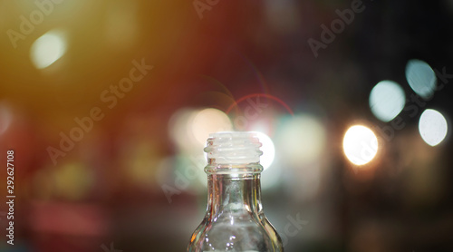 Glass bottles on the background bokeh bottle can be reused. So popular than plastic.