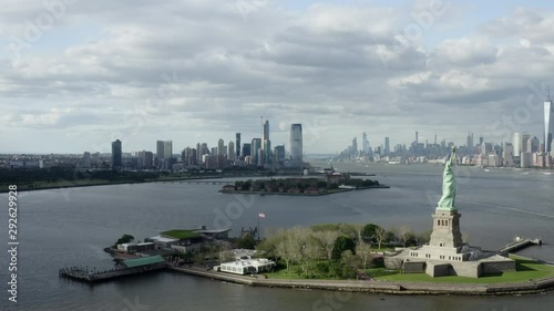 Aerial: The Statue of Liberty With New York City Across the Bay - New York City, New York