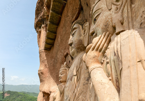 Close look of the huge Bodhisattva sculptures at Maijishan Grottoes, Tianshui, Gansu, China. Construction began at late fourth century CE. National heritage. photo