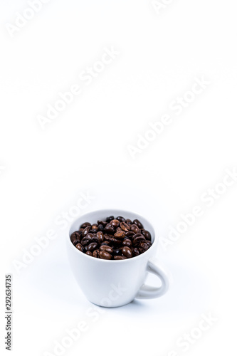 Cup with coffee bean on white