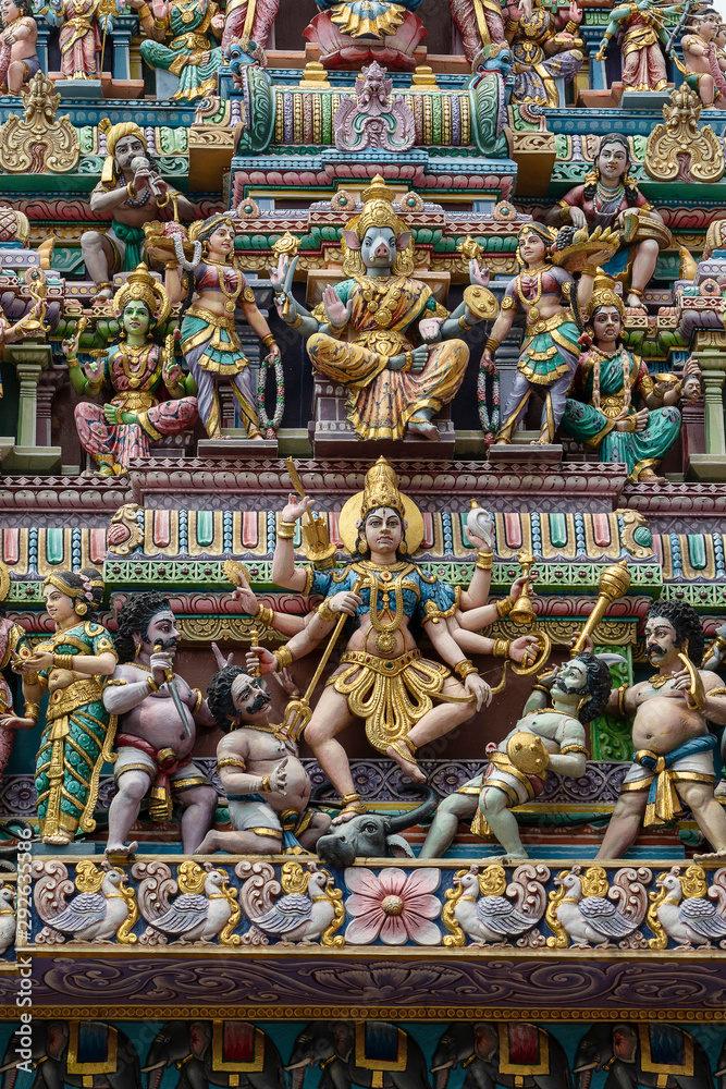 Colourful statues of Hindu religious deities adorning the entrance of a Hindu temple in Little India, Singapore city
