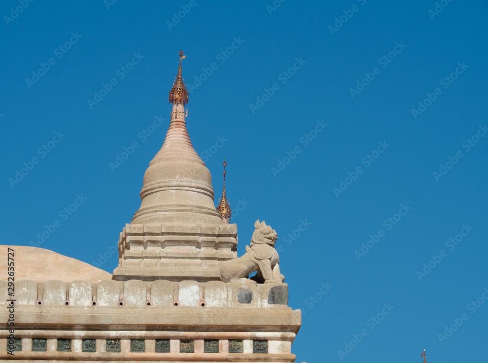 Exterior of Ananda temple in Bagan, Myanmar, Chinthe and small stupa. Beautiful and elegant building with well preserved.