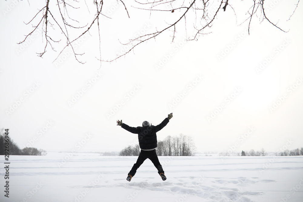 A man on a walk. Winter landscape. Tourist in winter journey. A man on a walk. Winter landscape. Tourist in winter journey.