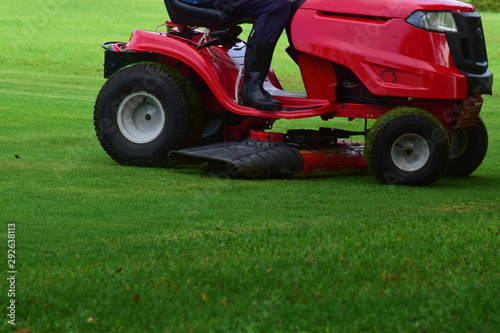 Mower and with a driver to take care of mowing in The football stadium always looks 