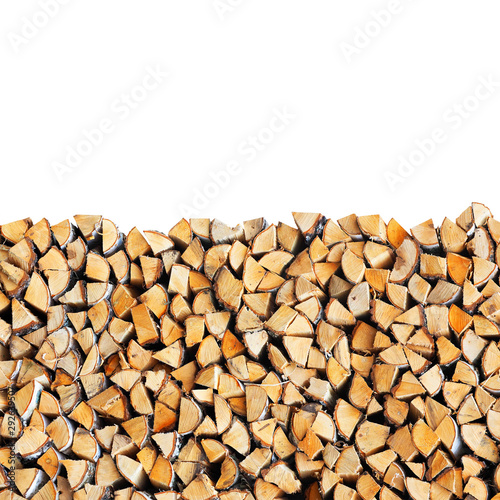 Canvas Print Woodpile of birch firewood isolated on white background