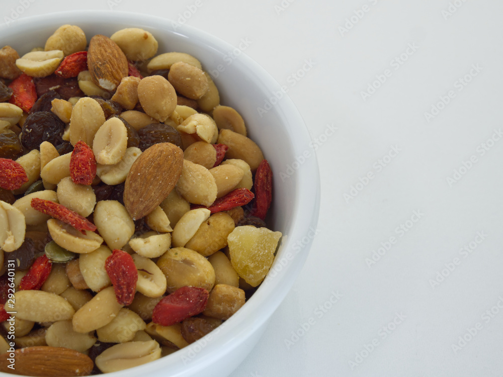 nuts in bowl on white background