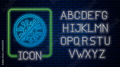 Glowing neon Stop virus, bacteria, germs and microbe icon isolated on brick wall background. Antibacterial and antiviral defence, protection infection. Neon light alphabet. Vector Illustration