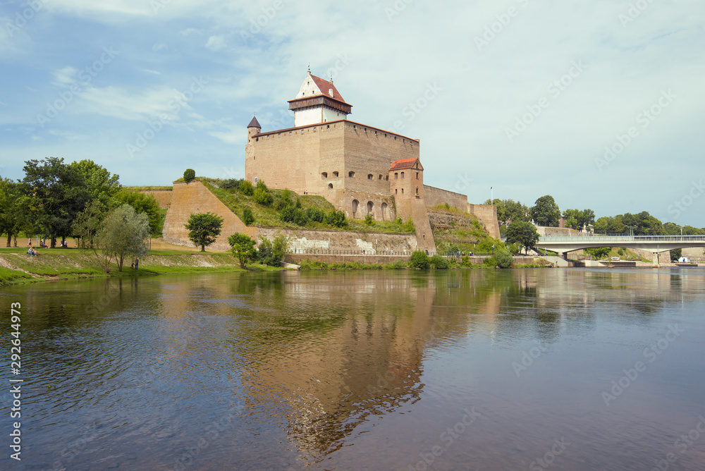 View of Herman Castle on a cloudy August day. Narva, Estonia