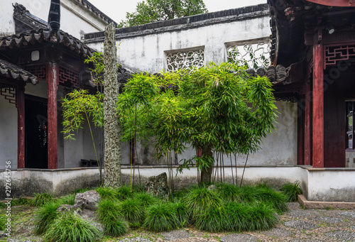 A corner with rockery pillar and bamboo in Master of the Nets Garden or Wangshi Garden in Suzhou  China  among the finest gardens in China and UNESCO World Heritage Site.