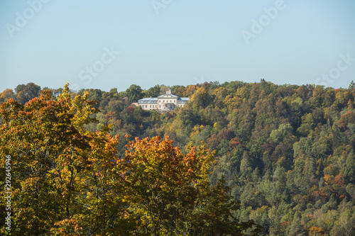 City Sigulda  Latvia Republic. Old renovated manor and trees with yellow leafs. 27. Sep. 2019