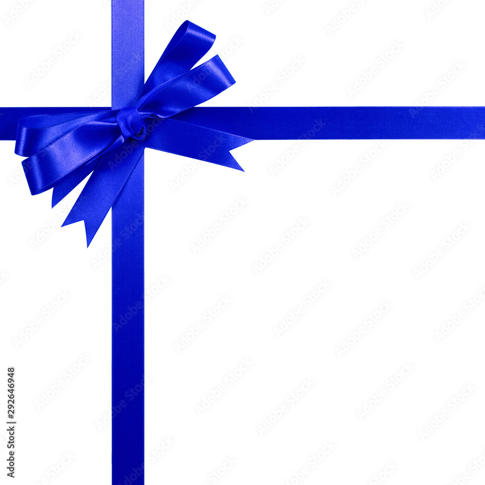 Deep blue gift ribbon bow vertical top corner border frame isolated on white. Deep blue gift ribbon bow vertical top corner border frame isolated on white.