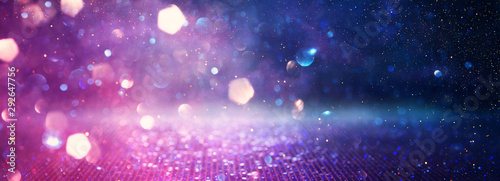 abstract glitter pink, purple and blue lights background. de-focused. banner