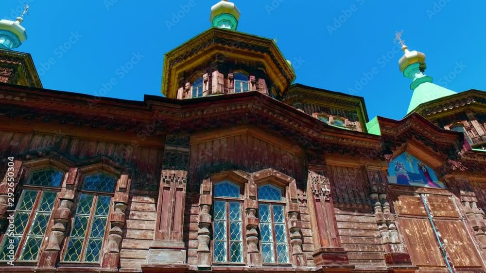 Old wooden russian church with colourful images Old wooden russian church with colourful images