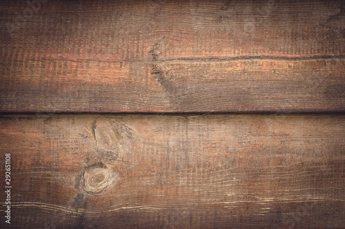 Rustic wood background. Brown wooden planks. Horizontal lines on dirty wall, fence. Vintage timber plank, scratched surface. Grunge texture. Shabby table. Pattern of oak table.