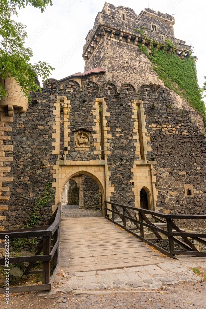 Medieval castle gate with bridge, tower and stone portal (Grodziec Castle, Poland)