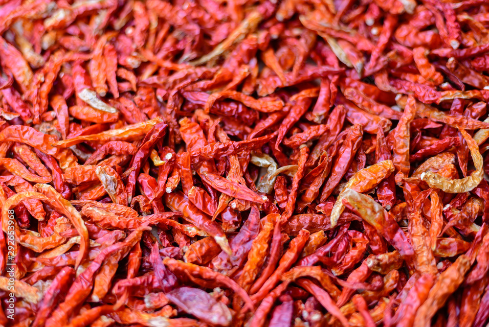 A close up shot of dried chillies Allow to dry before crushing for flavoring. The picture shows the surface of peppers, perfect for making a background image or adding a copy space.