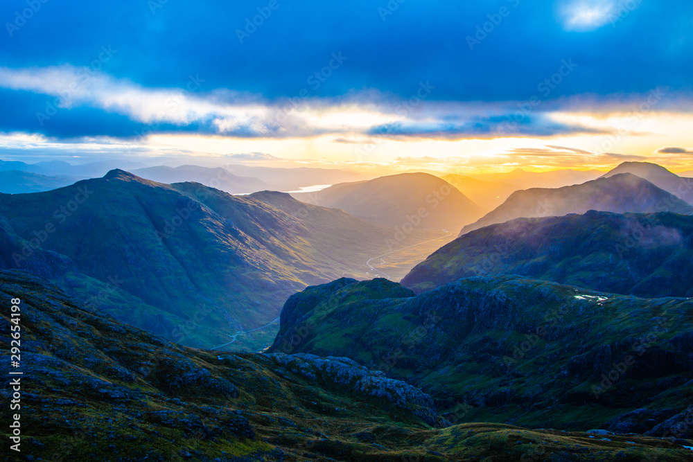 glencoe valley with sun light in scotland