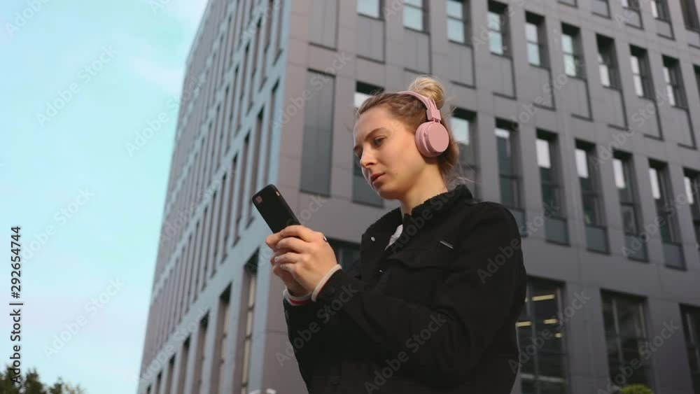 Pretty caucasian girl on business office background use smartphone in social internet media technology 5g Pretty caucasian girl on business office background use smartphone in social internet media technology 5g