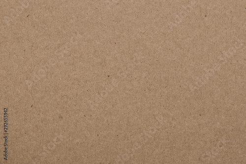 Texture of old paper, brown background. Packaging, vintage dirty page. Craft sheet, natural pattern. Carton container surface.