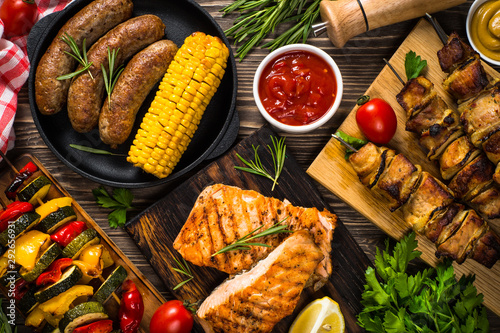 Barbeque dish - Grilled meat, fish, sausages and vegetables.