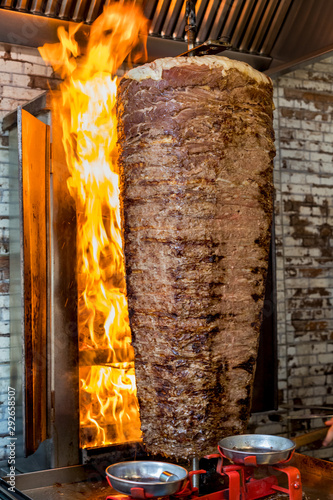 Authentic turkish doner kebab rolling outside of a restaurant on the streets of Istanbul, Turkey.