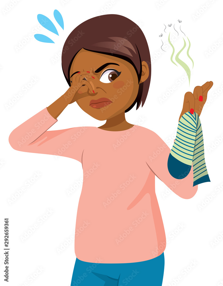 Funny action scene young black woman picking bad smelling sock Funny action scene young black woman picking bad smelling sock