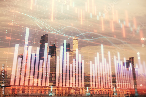 Double exposure of financial graph on downtown veiw background. Concept of stock market research and analysis © Andrey