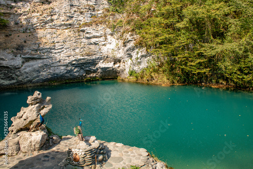The blue lake in the mountains of Abkhazia has the healing power of rejuvenation photo