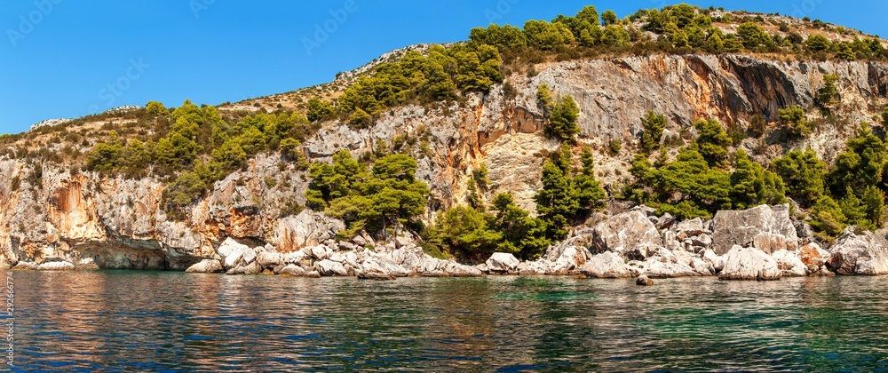 Big panorama of rocky coast of Hvar island - Croatia. Rocks over the sea. Cove Malo Zarace. Holiday in Croatia.